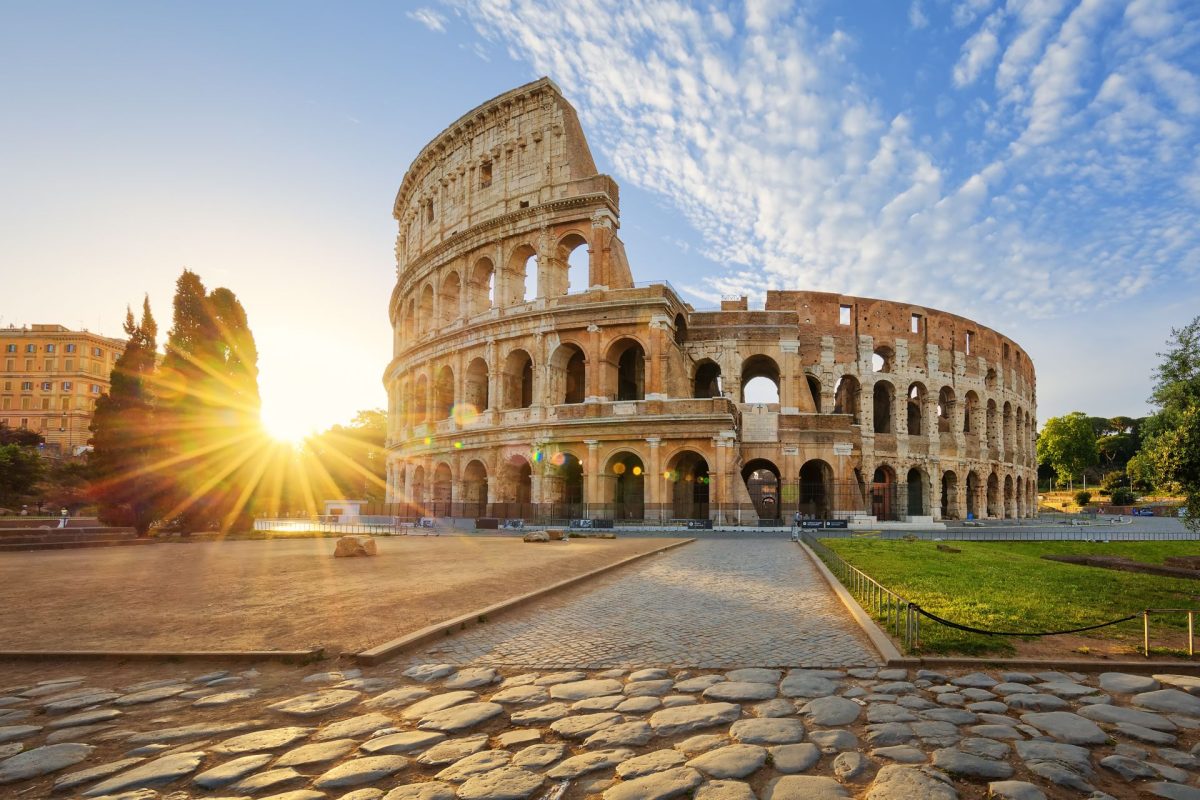 View-Of-Colosseum-In-Rome-And-Morning-Sun-Italy