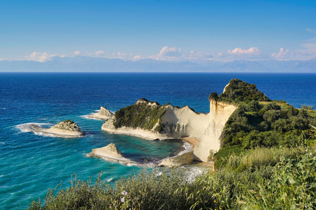 Scenic view of Cape Drastis in Corfu Island, Greece with the calm blue sea