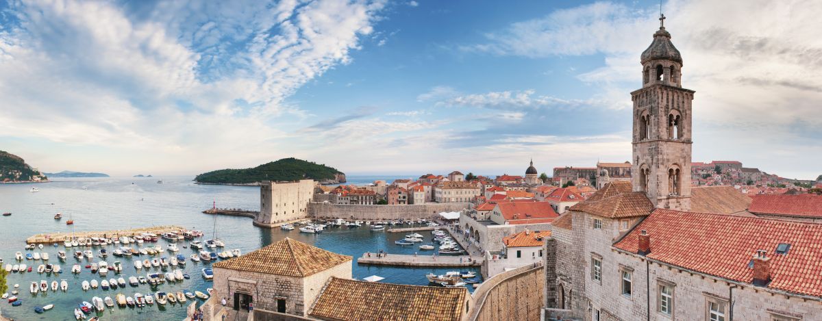 Panoramic photo of Dubrovnik Old Town Harbor and the Dominican Monastery from Dubrovnik city walls,